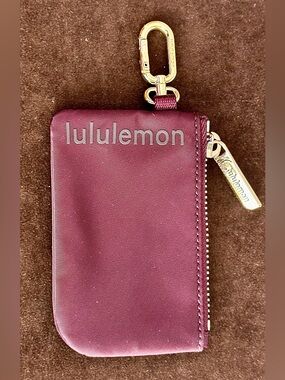 lululemon athletica plum key clip pouch with gold hardware unisex bag